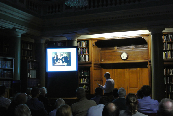 David Bate shows the Society's famous painting 'Discussion on the Piltdown Skull'